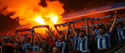 The passionate supporters of Everton Women create a vibrant atmosphere at Walton Hall Park, embodying the spirit of the...